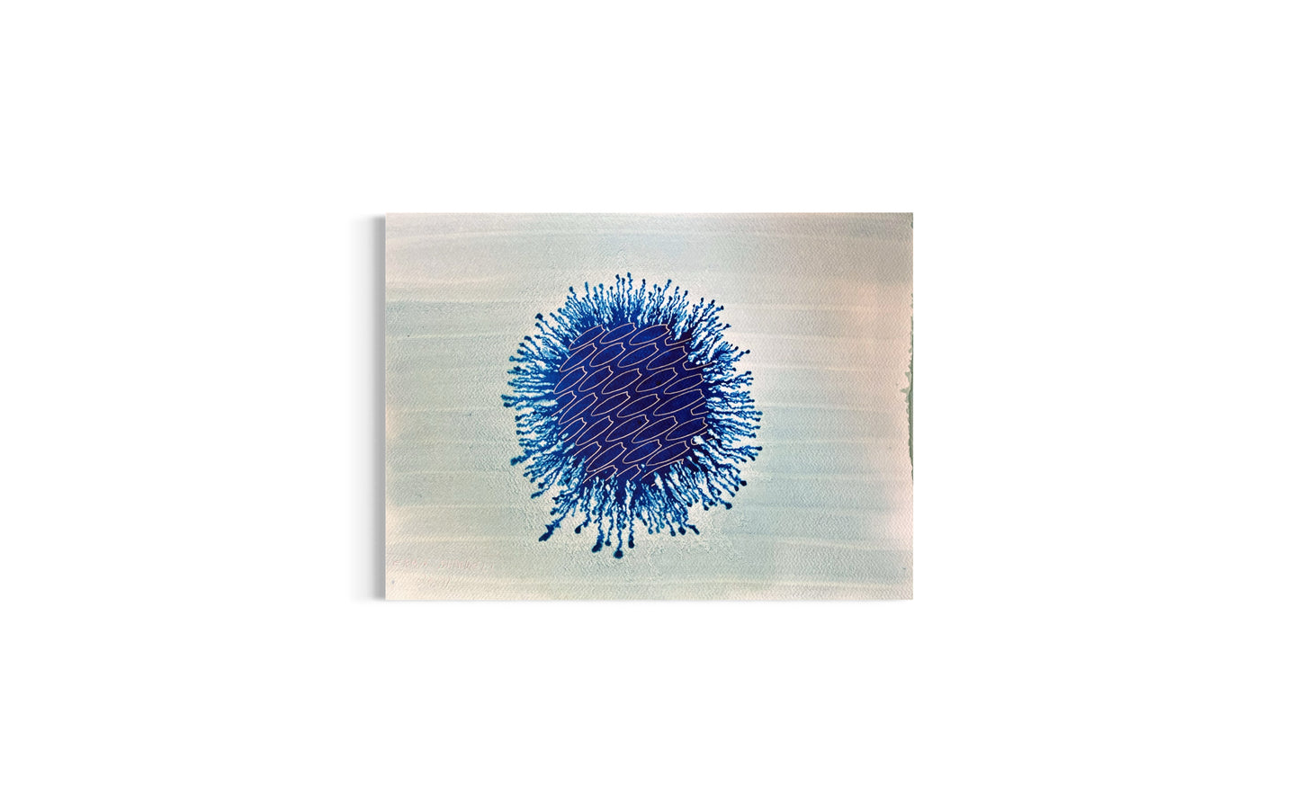 Abstract art piece with a blue circular design on a light gray background