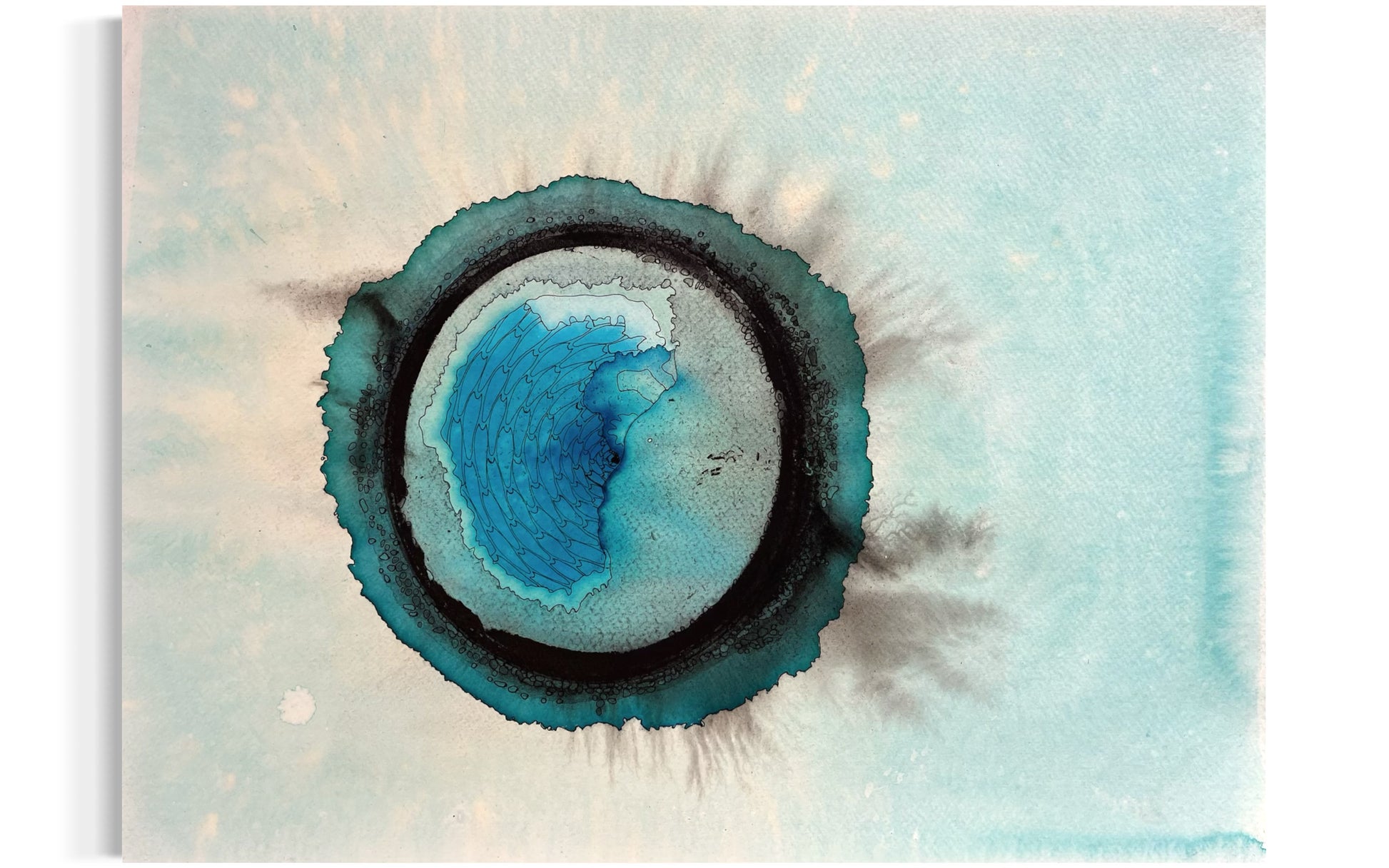 Abstract art piece with concentric circular patterns in blue and green on a light background